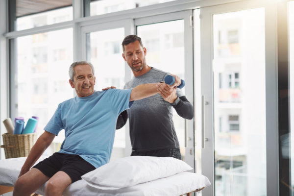 patient holding arm out in lateral motion after reverse shoulder arthroplasty